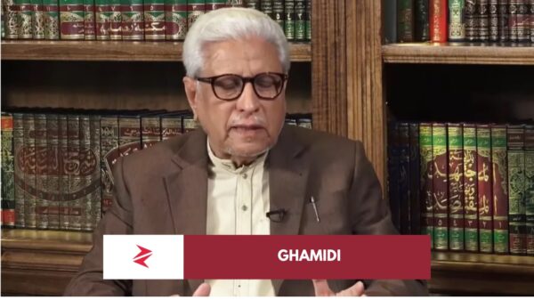 Islamic scholars studying classical manuscripts in a traditional library reflecting debate within Islamic thought.