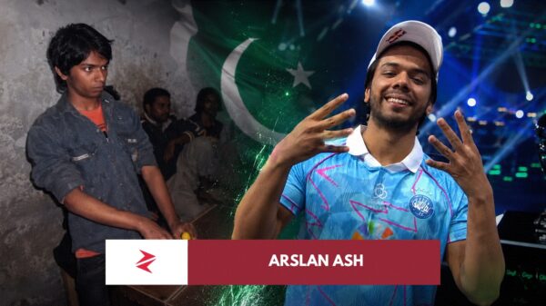 Young Arslan Ash playing Tekken in a Lahore arcade beside the Pakistani eight-time EVO champion