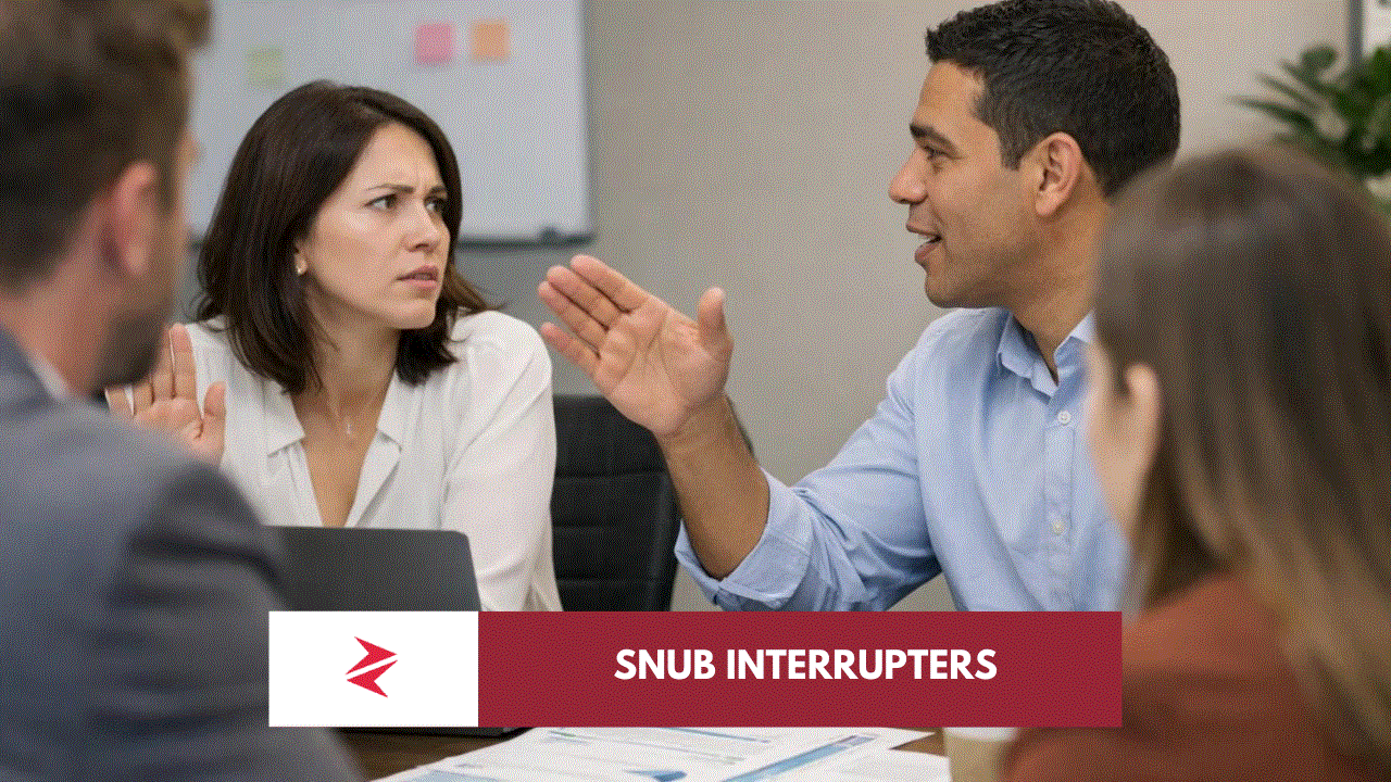 Professional calmly using eye contact and a hand gesture to stop an interruption during a workplace meeting