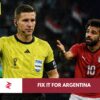 Referee François Letexier officiating the controversial Egypt vs Argentina FIFA World Cup match as Mohamed Salah questions a decision.
