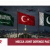 Flags of Saudi Arabia, Türkiye and Pakistan above Makkah representing the Makkah Joint Defence Agreement