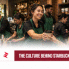 Starbucks corporate culture represented by baristas working together and serving a customer during a busy coffeehouse shift