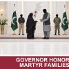 AI-generated editorial illustration: Conceptual editorial illustration for Governor Honors Martyr Families. Not a documentary photograph.